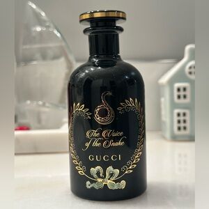 Gucci Black and Gold Fragrance Bottle